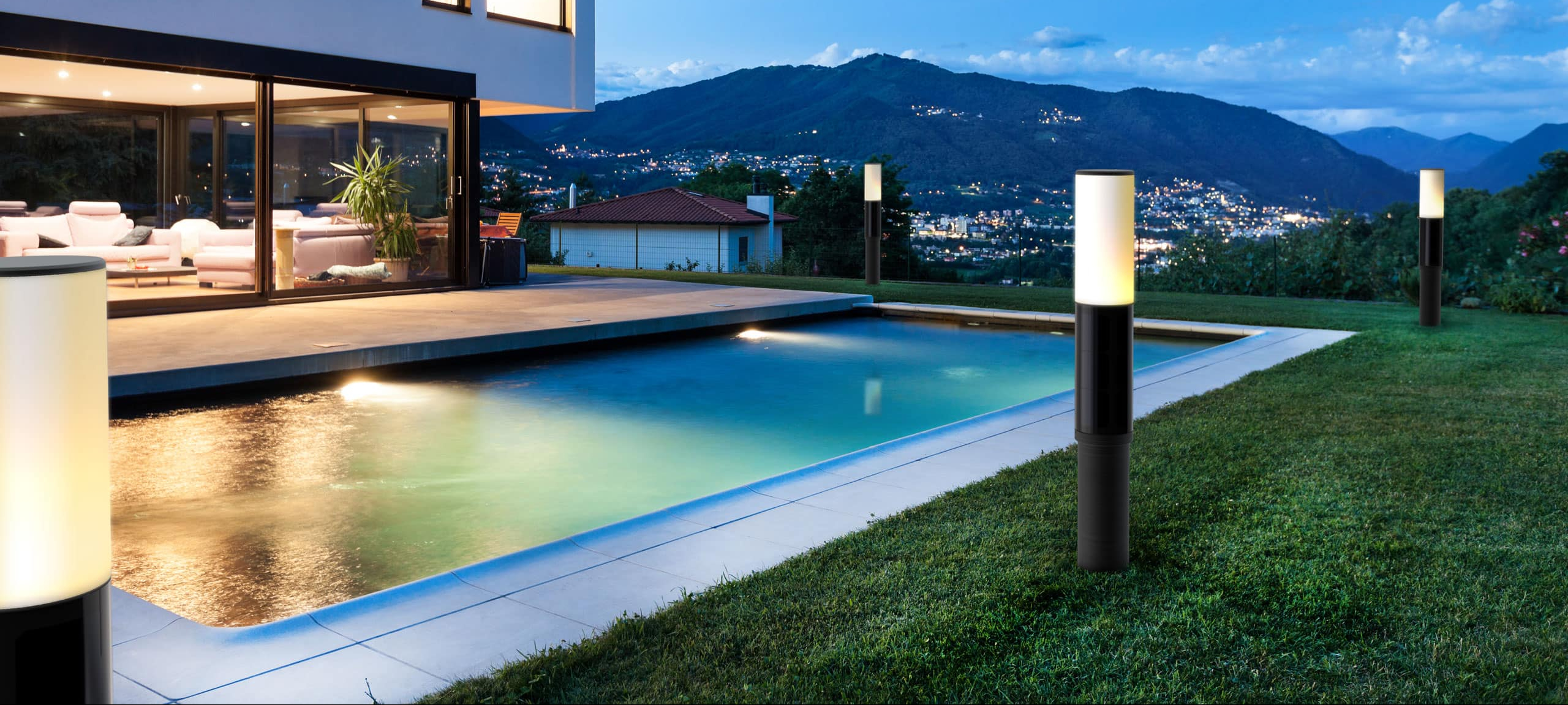 Soluxio-NxT-solar-bollard-at-swimming-pool-cropped Solar outdoor lighting - NxT solar powered solar lamp post RGB color LED garden light for resorts, parks, hotels